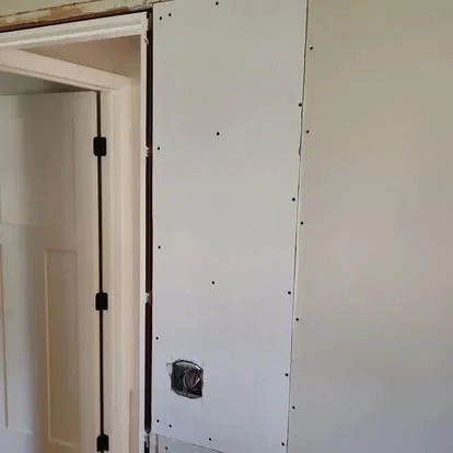 Wallboard fitted during an interior doorway repair